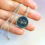 medallion style brain necklace by xanne fran in collaboration with inclusive neuroverse