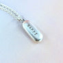 happy pill necklace by xanne fran