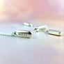 to scale cylinder pill necklace