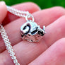 underside of snail necklace showing smooth belly