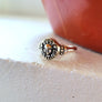 ufo shaped signet ring with an alien in the middle, solid sterling silver