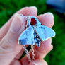 backside showing mothman butt and silver hallmark