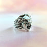 rage scream ring in solid sterling with mouth open and flowing hair