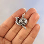 backside of alien charm with 925 and XF maker's mark
