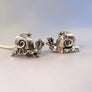 two alien snails facing each other to show backside is fully 3 dimensional