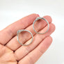 side view of angel devil stacking rings