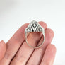 side profile of lion biker ring