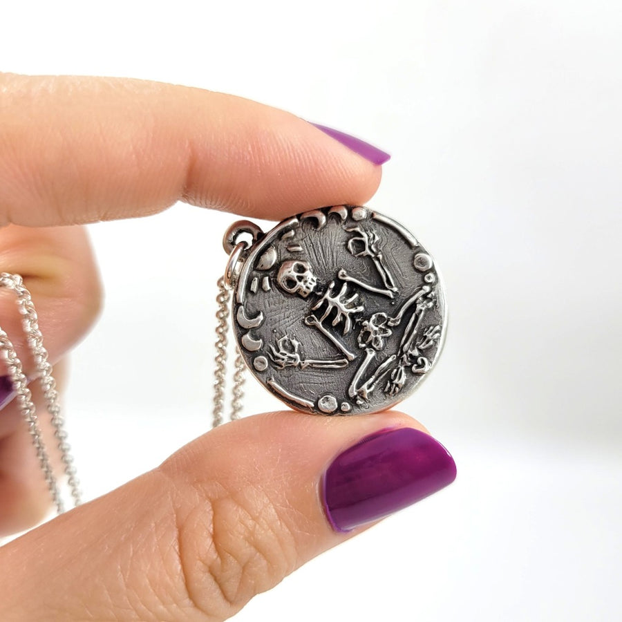 skeleton coin pendant by xanne fran