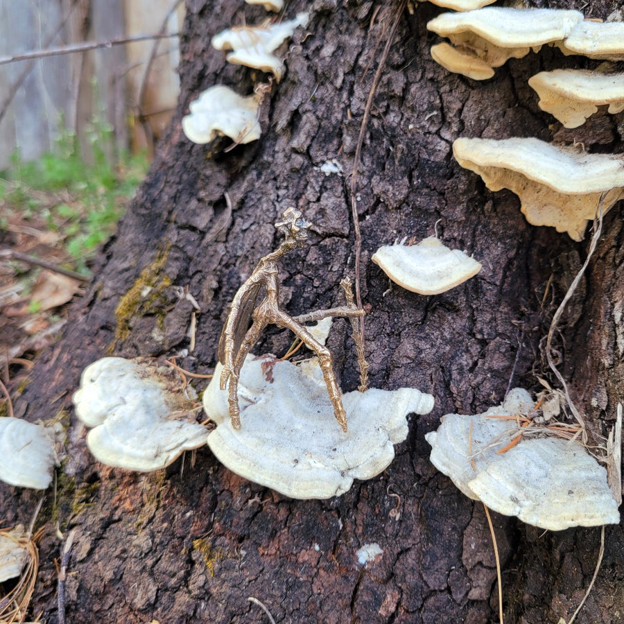 stick fairy on a mushroom