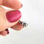 925 hallmark on side of charm