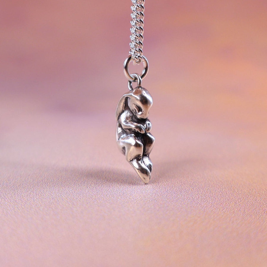 side view of 3D baby bunny charm necklace