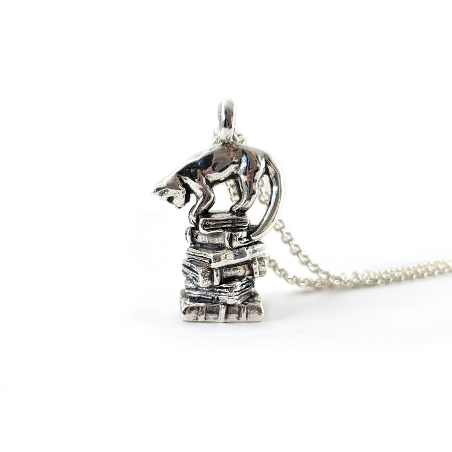book cat pendant standing upright on its own