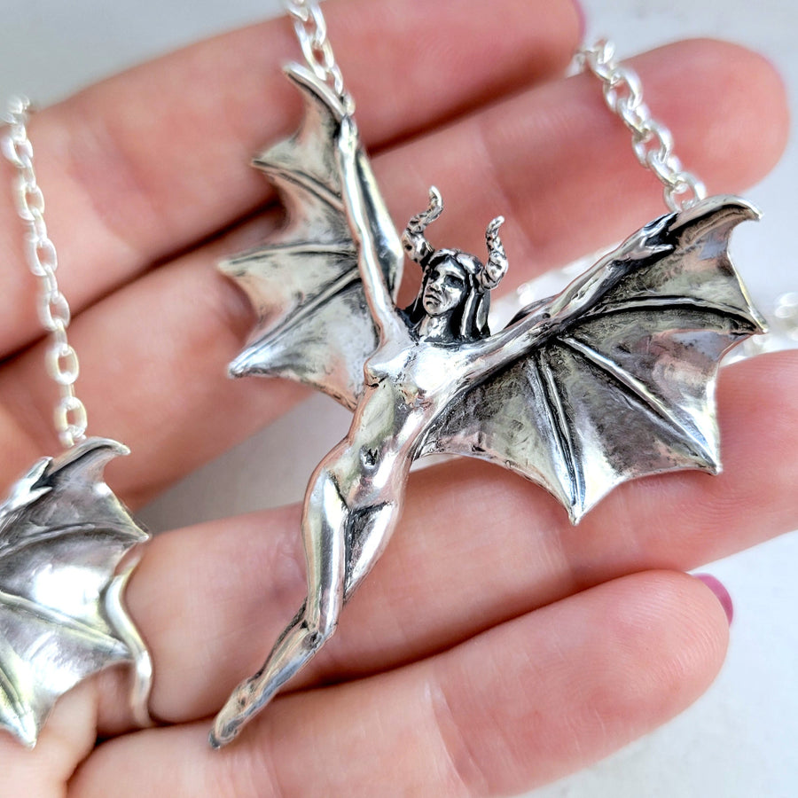 sculpted winged woman with horns in solid sterling silver by xanne fran