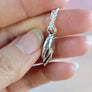 fingers crossed necklace detail showing 925 hallmark and XF maker's mark