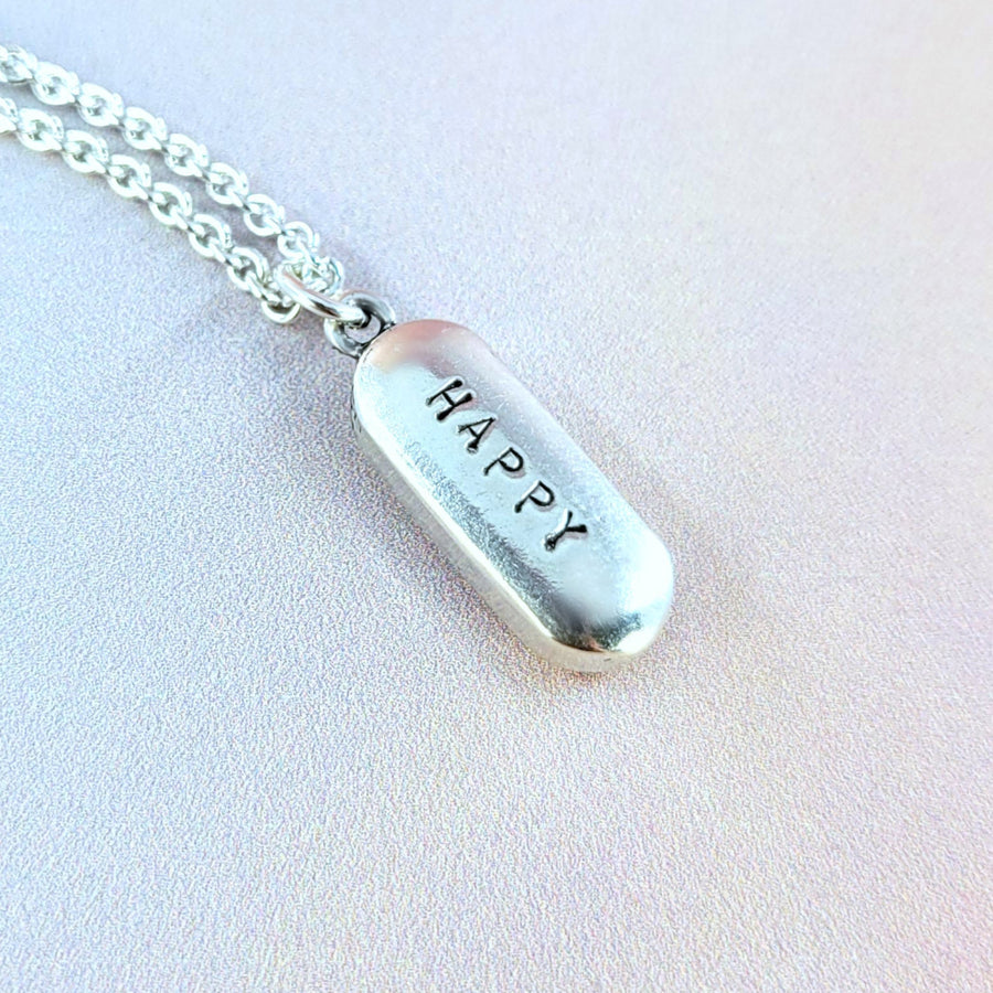 happy pill necklace by xanne fran