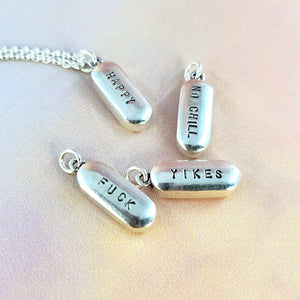 customized stamped pill necklaces handcrafted by xannefran