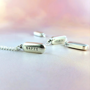to scale cylinder pill necklace