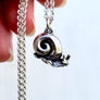 detailed sterling land snail necklace handcrafted by xanne fran studios