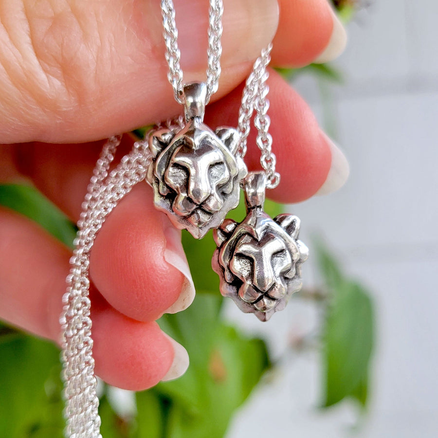 two small leo necklaces handmade by xannefran