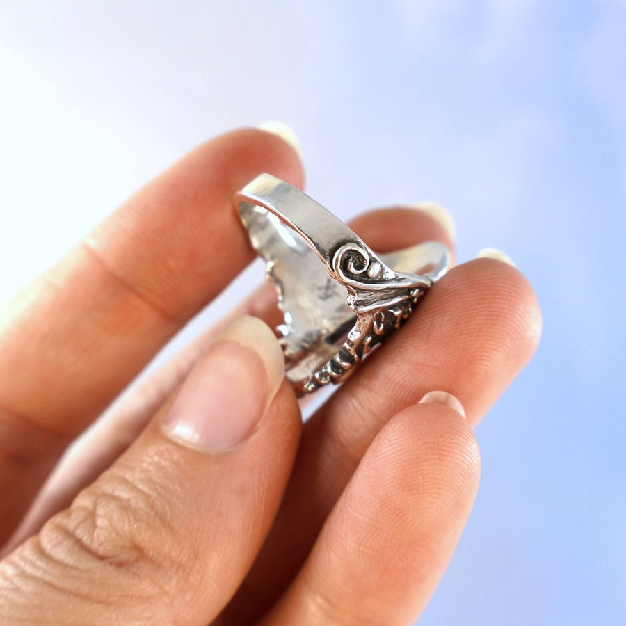 dragon wing detail on side of heavy sterling silver fantasy ring