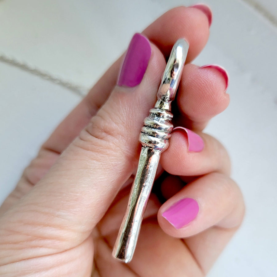 side profile showing thickness of solid sterling silver handmade rat key