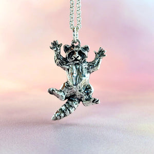 adorable raccoon pendant in sterling silver