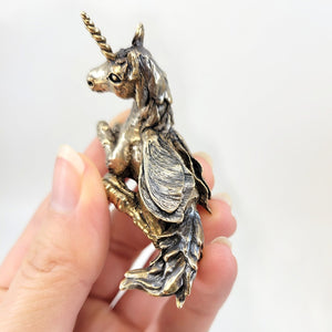detailed samara wings on unicorn sculpture by xanne fran