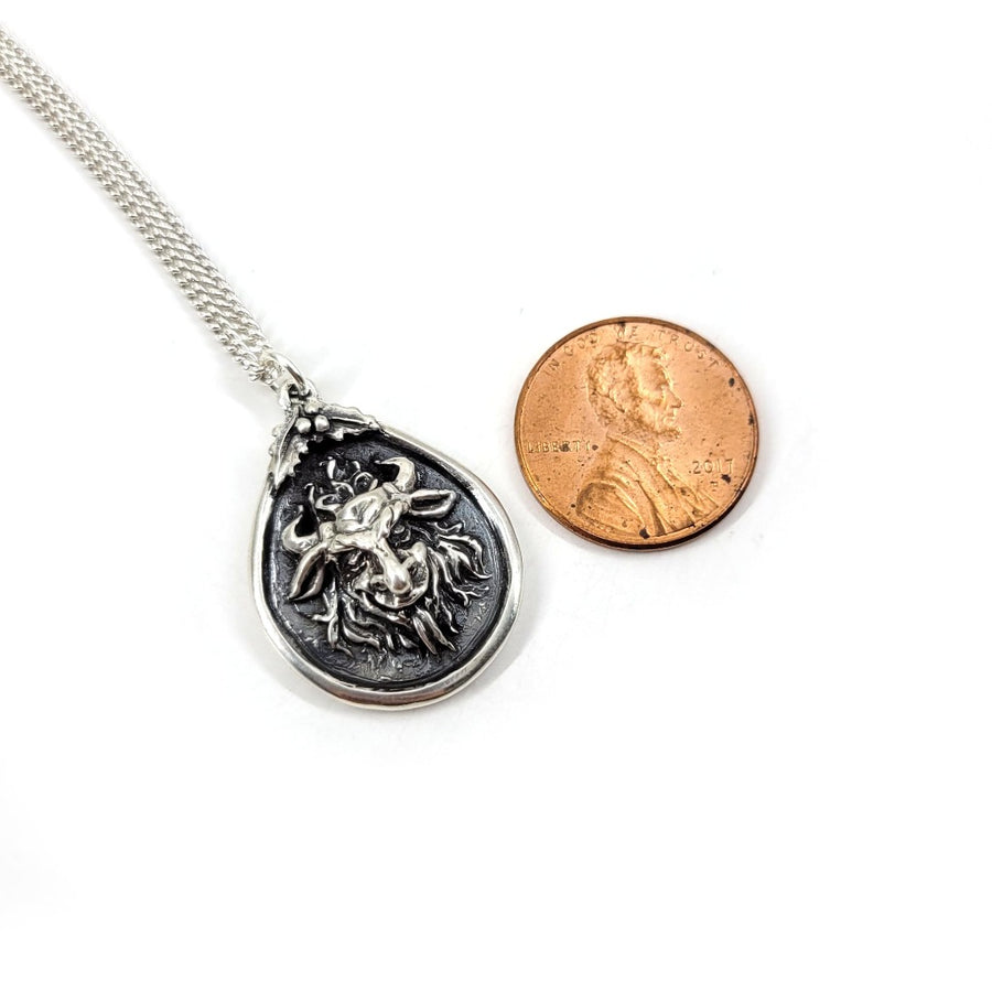 krampus necklace the size of a penny