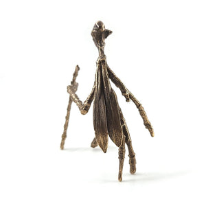 walking stick fairy sculpture from back