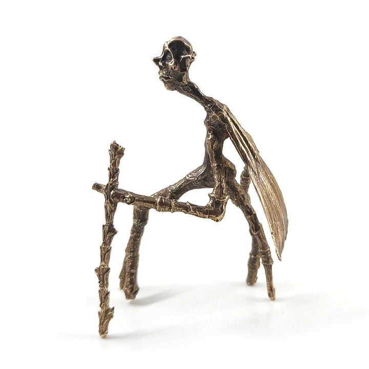 walking stick fae sculpture in bronze